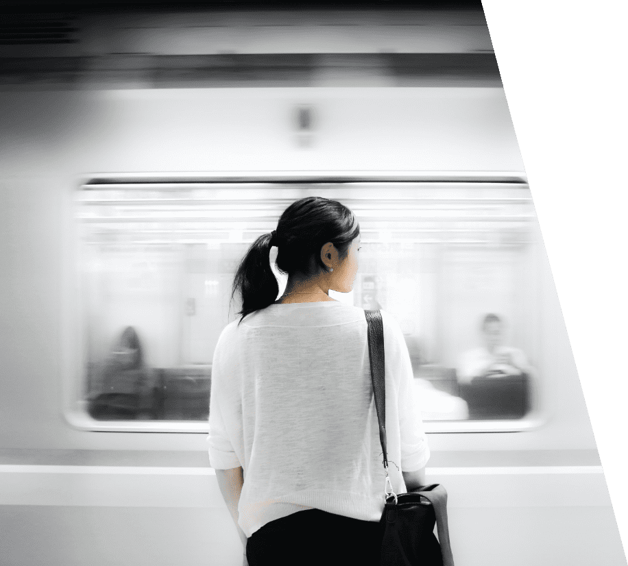 a woman waiting the train